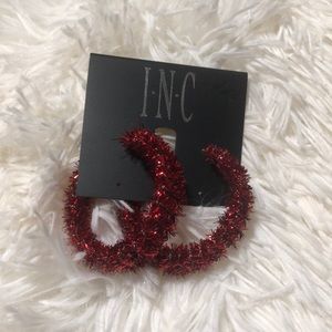 I•N•C red hood earrings brand new with tags attached.